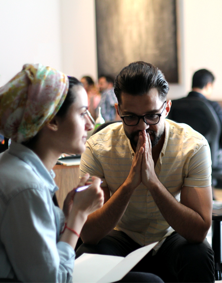 LIMAH Team discussing wayfinding at a meeting at the Alserkal Studio